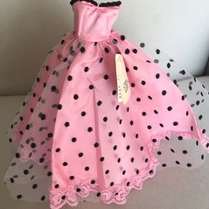Adorable dress and hoop for Barbie sized doll.